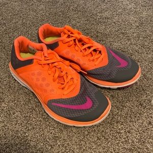Nike running shoes, very good condition. Rarely worn. Too big for me.